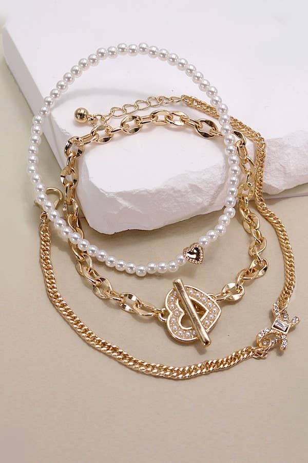 CONJUNTO DE PULSERA DE 3 FILAS DE PERLAS BOW HAERT | 80B217