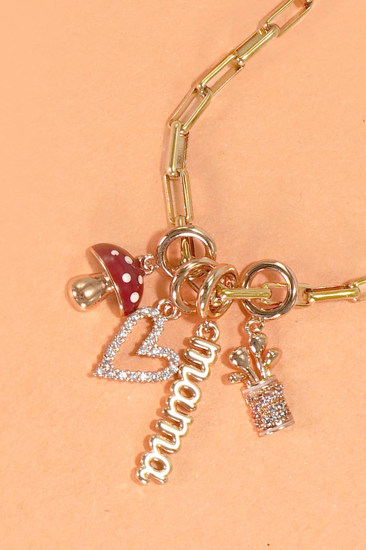CHARMS EN GRUPO - CHARMS DE ACERO TITANIO O LATÓN | 40CM100