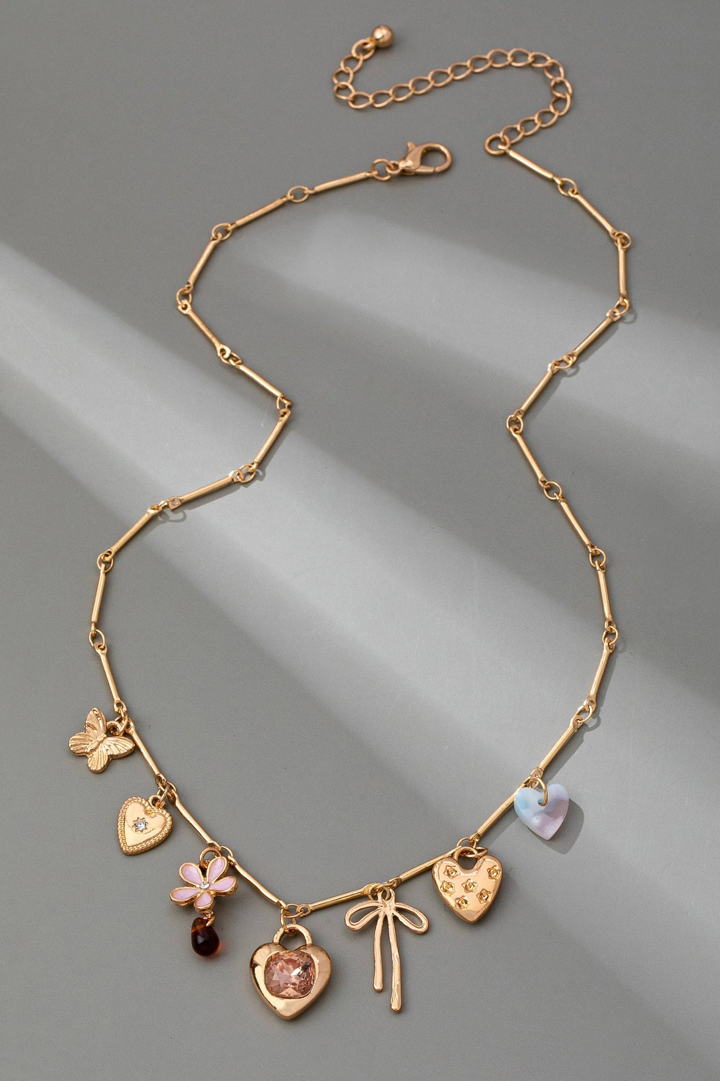 CHARM NECKLACE-HEARTS FLOWER BOW BUTTERFLY | 80N92639