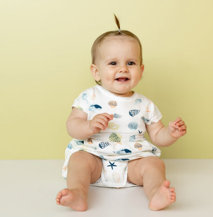 Coccoli Infant Girl Cotton-Modal Skirted Romper - Seashells on Cream