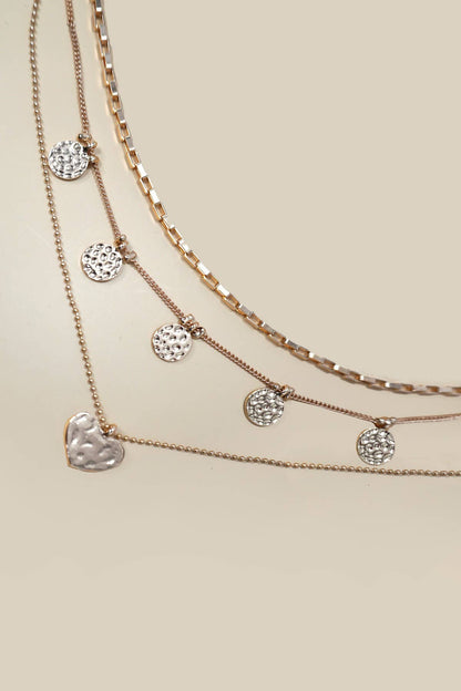 COLLAR MULTICAPAS CON DISCO MARTILLADO EN FORMA DE CORAZÓN | 80N1224