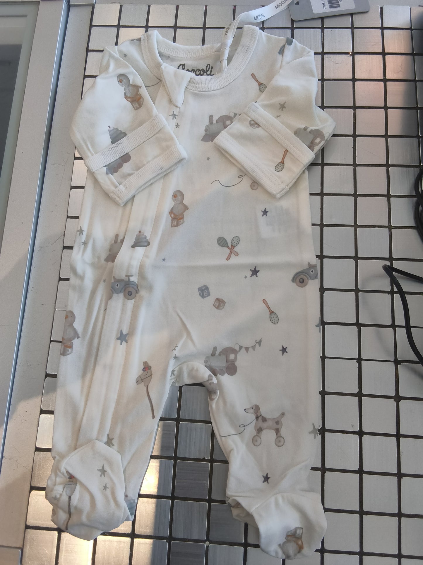 Coccoli: Toys On Cream Zipper Footie